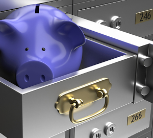 Safe deposit boxes with a blue piggy bank in one of the drawers.